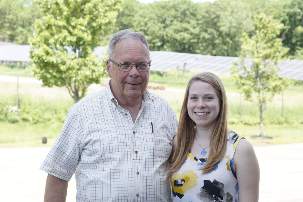 Douglas, one of our customers at the Dover Community Solar farm in Massachusetts, with Solstice outreach member Madeline Iffert.